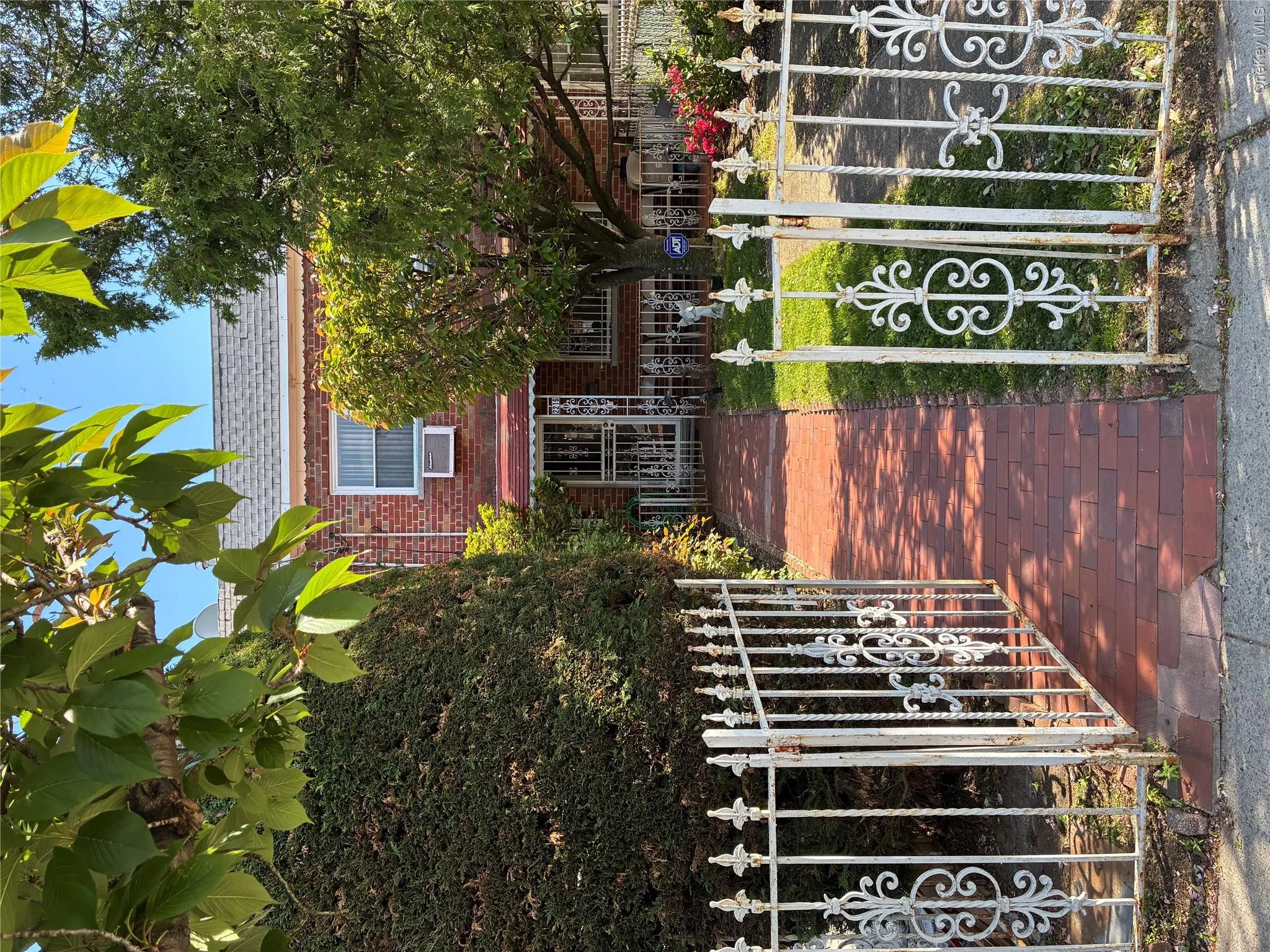 Gate into entry area to home Gate into entry area to home