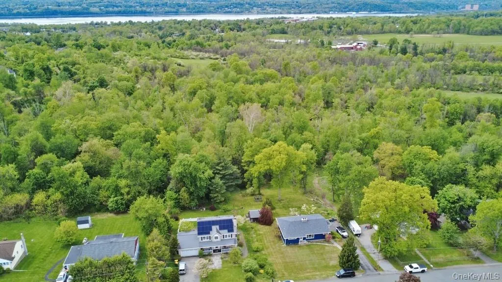 Ariel View of the home backing up to the Nature park offering additional privacy and enjoyment. Ariel View of the home backing up to the Nature park offering additional privacy and enjoyment.