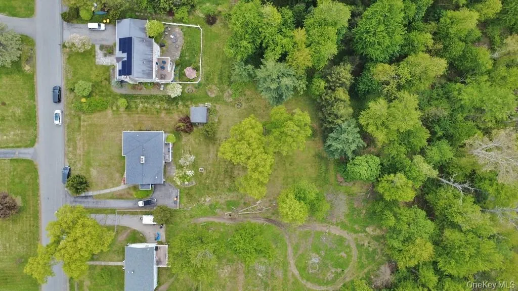 Ariel view of the home and backyard. Ariel view of the home and backyard.