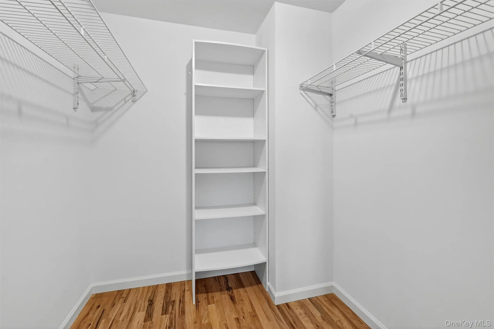 A generous walk-in closet off of the first foor bedroom gives this bedroom the kind of everyday storage that keeps life feeling organized and easy. A generous walk-in closet off of the first foor bedroom gives this bedroom the kind of everyday storage that keeps life feeling organized and easy.
