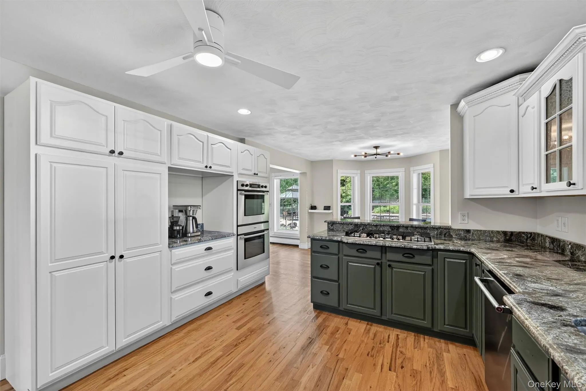 The kitchen provides plenty of room to cook, gather, and move with ease, while the nearby dining area keeps everything feeling connected. The kitchen provides plenty of room to cook, gather, and move with ease, while the nearby dining area keeps everything feeling connected.