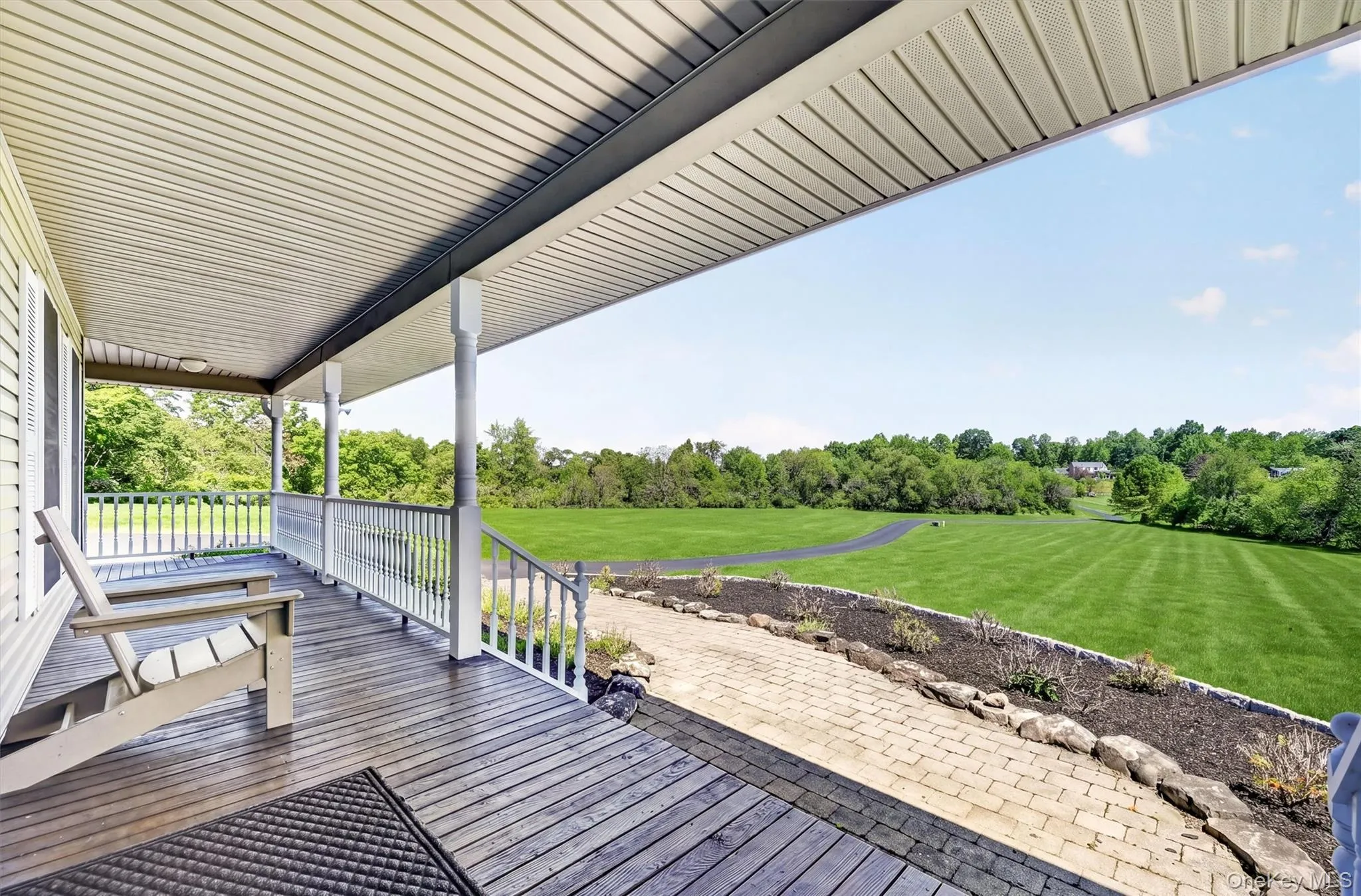 The porch offers a quiet place to sit, take in the view, and enjoy the peaceful rhythm of the property. The porch offers a quiet place to sit, take in the view, and enjoy the peaceful rhythm of the property.