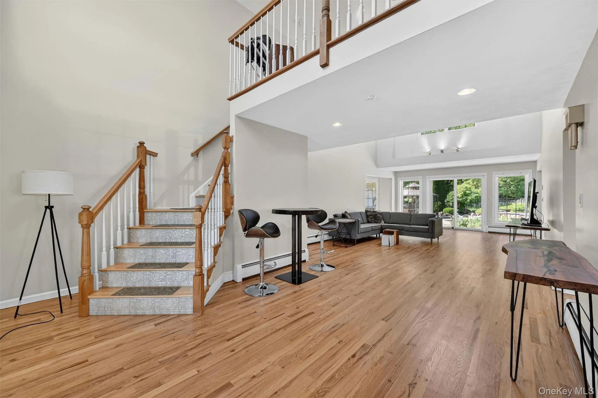 The moment you step inside, the home opens up with soaring ceilings, hardwood floors, and a bright, comfortable layout made for everyday living. The moment you step inside, the home opens up with soaring ceilings, hardwood floors, and a bright, comfortable layout made for everyday living.