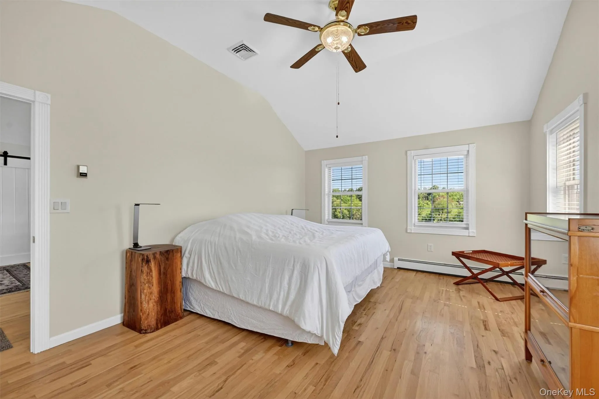The second-floor primary suite offers a quiet blank slate, ready to be styled into your own private retreat. With a spacious bedroom, large walk-in closet, and ensuite bath with dual sinks and a shower, this suite adds comfort, flexibility, and privacy to the home’s thoughtful layout. The second-floor primary suite offers a quiet blank slate, ready to be styled into your own private retreat. With a spacious bedroom, large walk-in closet, and ensuite bath with dual sinks and a shower, this suite adds comfort, flexibility, and privacy to the home’s thoughtful layout.
