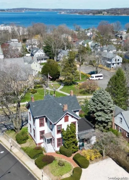 Birds eye view of property with a water view Birds eye view of property with a water view