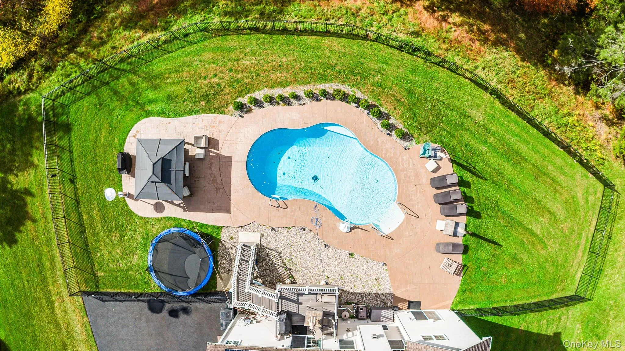 Aerial view of a pool area Aerial view of a pool area