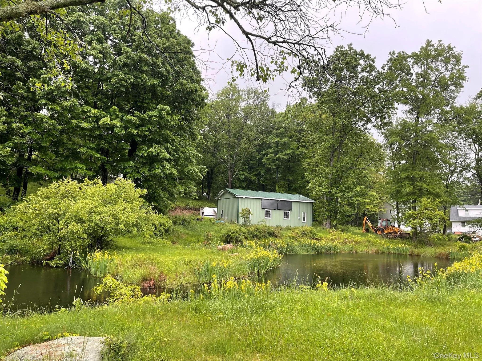 View of yard featuring a water view View of yard featuring a water view