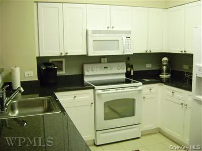 Another view of the large kitchen. Another view of the large kitchen.