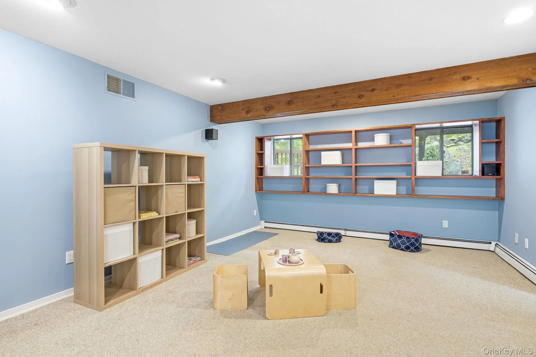 The lower level expands the home's functionality with a recreation area The lower level expands the home's functionality with a recreation area