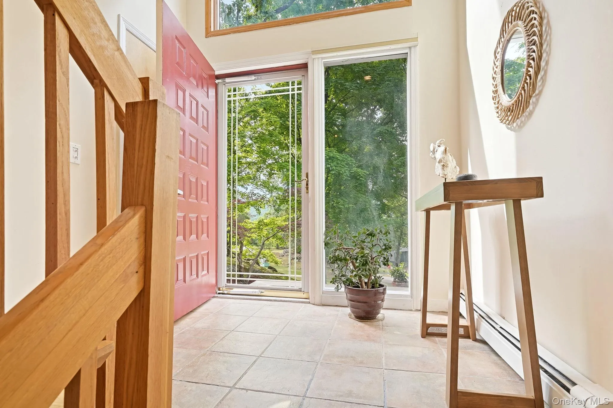 The sun-filled foyer greets you right as you step inside! The sun-filled foyer greets you right as you step inside!