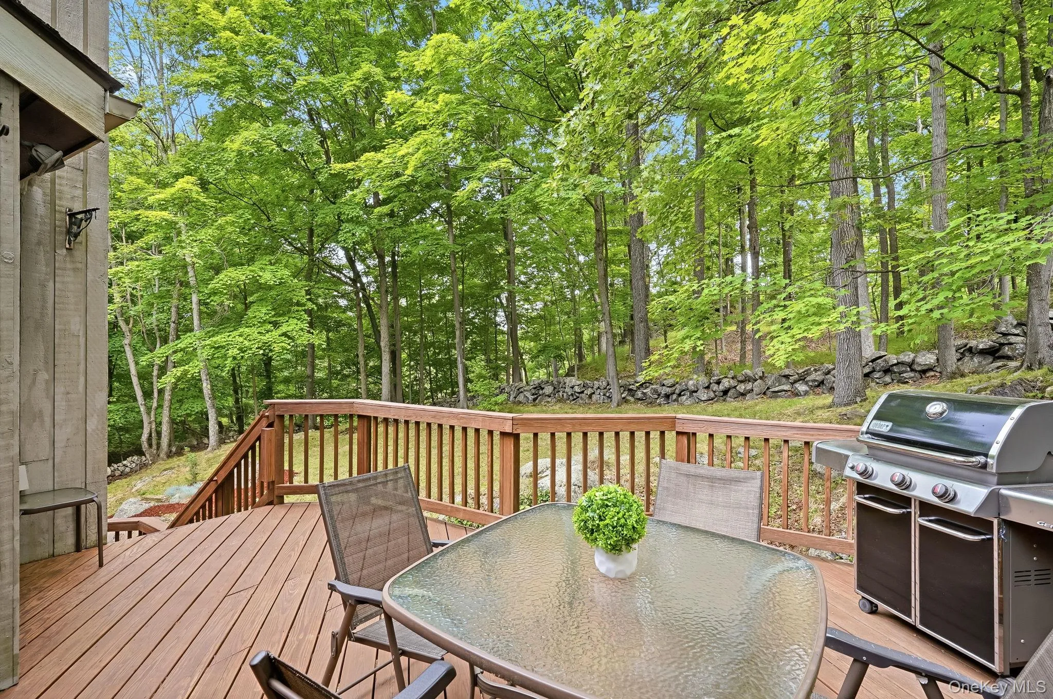 View of the spacious multi-level deck overlooks the backyard View of the spacious multi-level deck overlooks the backyard