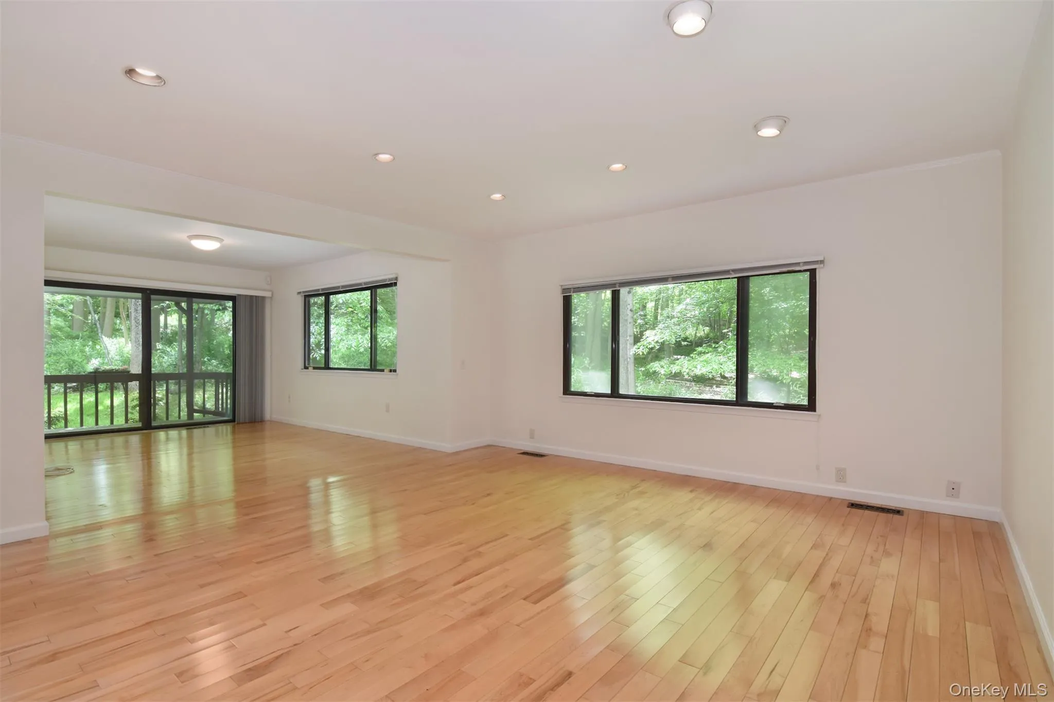 Open concept living and dining room. Open concept living and dining room.