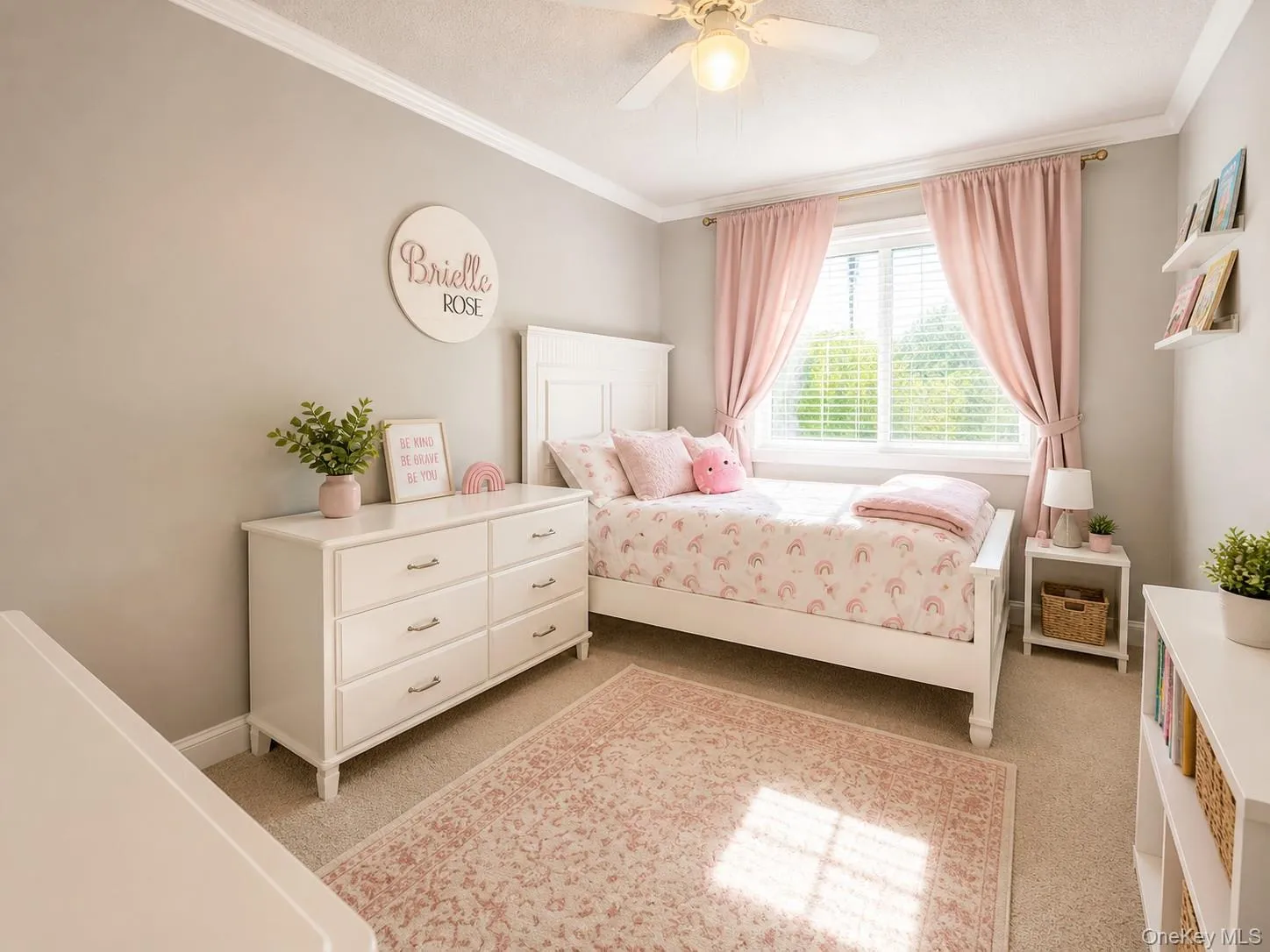Carpeted room featuring a ceiling fan, crown molding, and a window with blinds Carpeted room featuring a ceiling fan, crown molding, and a window with blinds