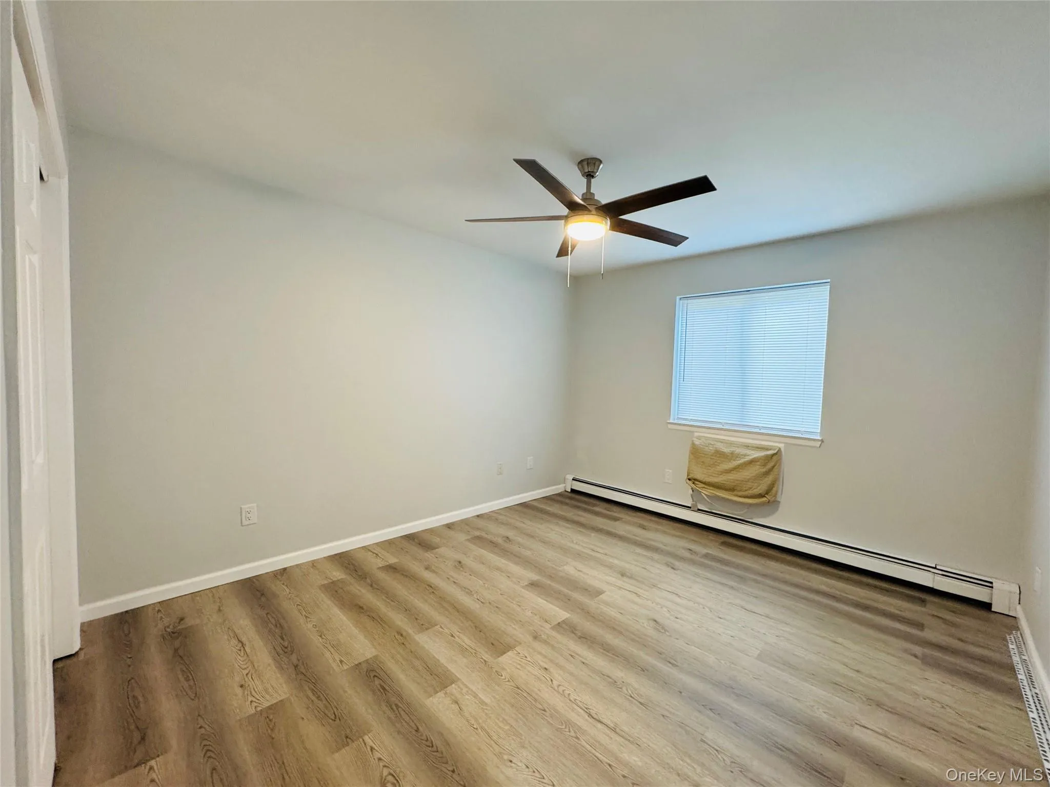 1st Bedroom with vinyl flooring, light/fan, blinds and air conditioner. 1st Bedroom with vinyl flooring, light/fan, blinds and air conditioner.