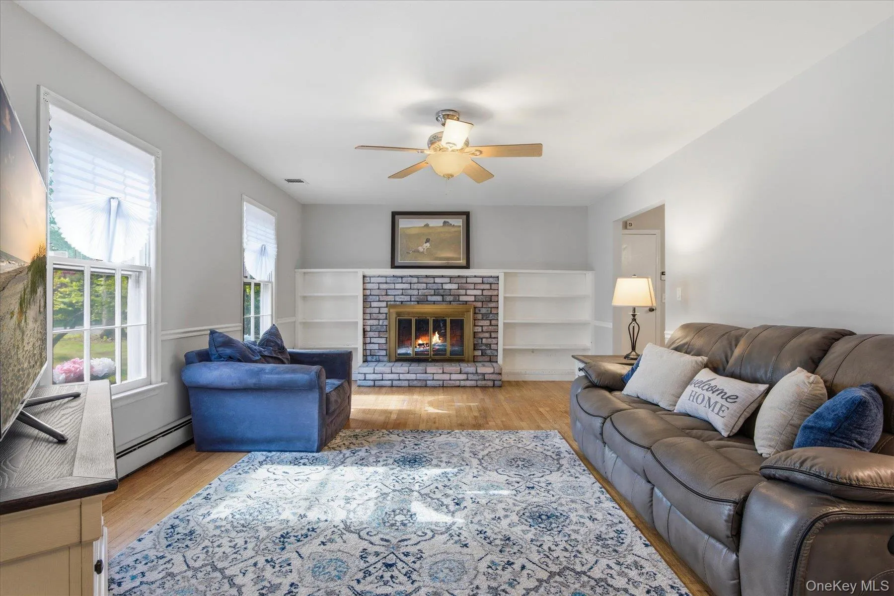 Formal living room with fireplace and built in bookcases Formal living room with fireplace and built in bookcases