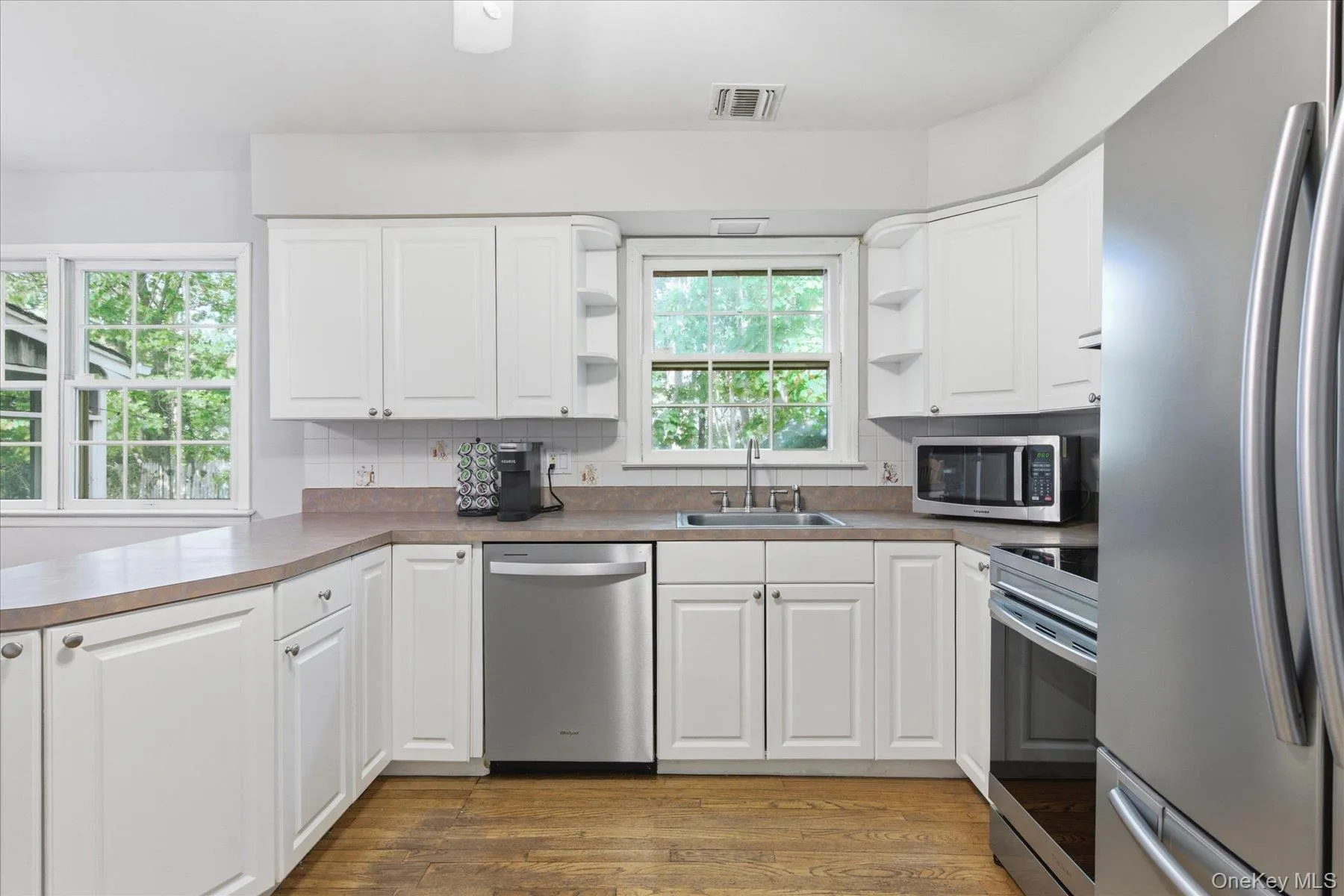 Eat In kitchen with plenty of counter space and newer Stainless Steel Appliances Eat In kitchen with plenty of counter space and newer Stainless Steel Appliances