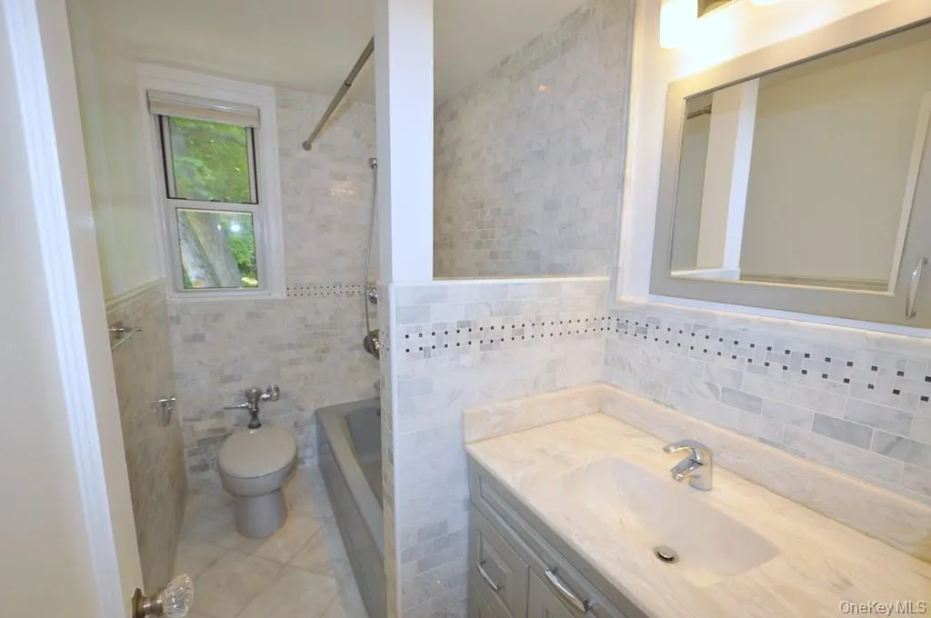 Main Hall Bath: Totally redone and also with a window Main Hall Bath: Totally redone and also with a window