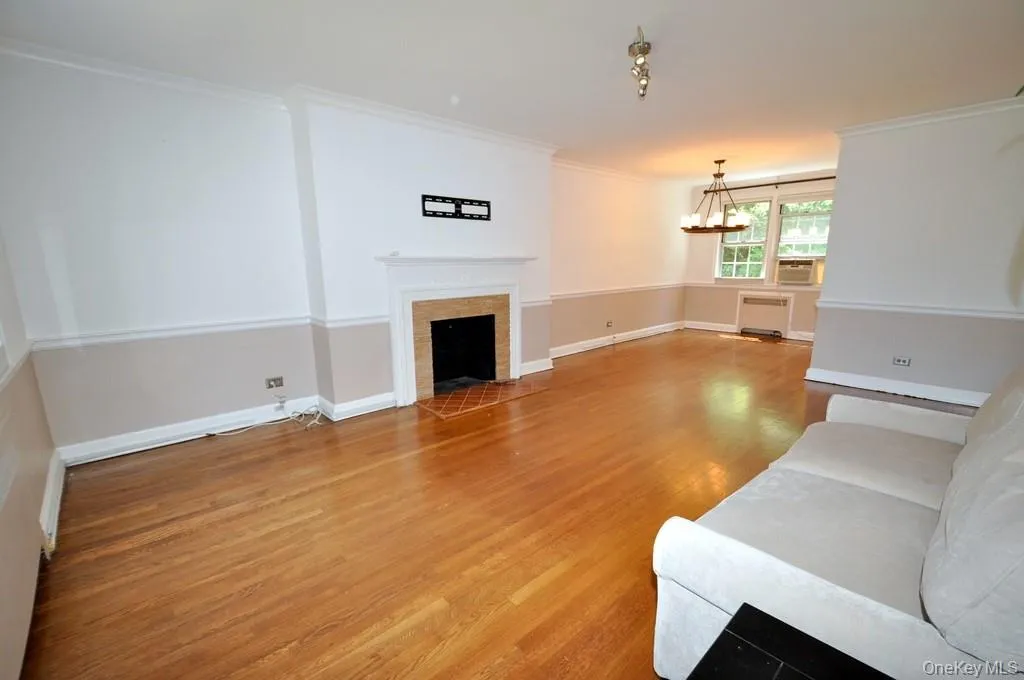 Living Room : French doors are off open den area at end of long entry hall brings you to this bright spacious Living room Living Room : French doors are off open den area at end of long entry hall brings you to this bright spacious Living room