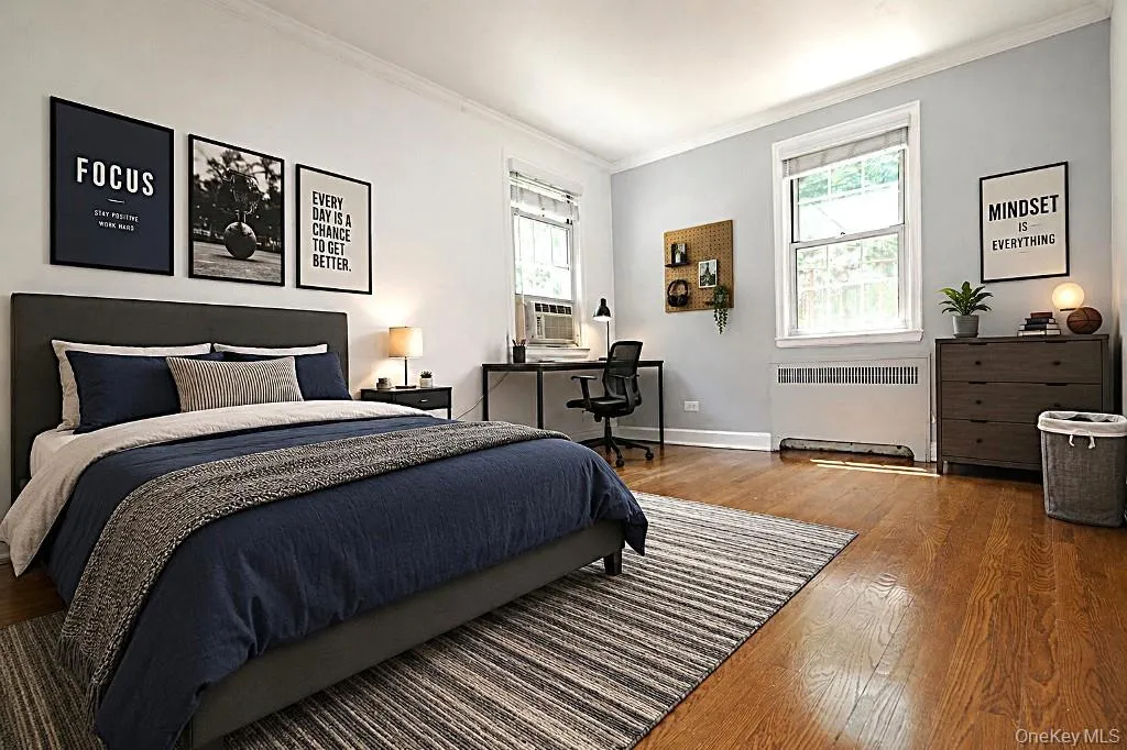 Photo Visually Staged - Corner Second Bedroom (another view)faces south and west. Has hardwood floors.(another view) Photo Visually Staged - Corner Second Bedroom (another view)faces south and west. Has hardwood floors.(another view)