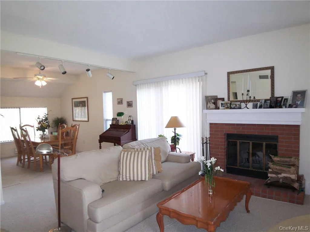 Living Room w/Slider to Deck Open to DR Living Room w/Slider to Deck Open to DR