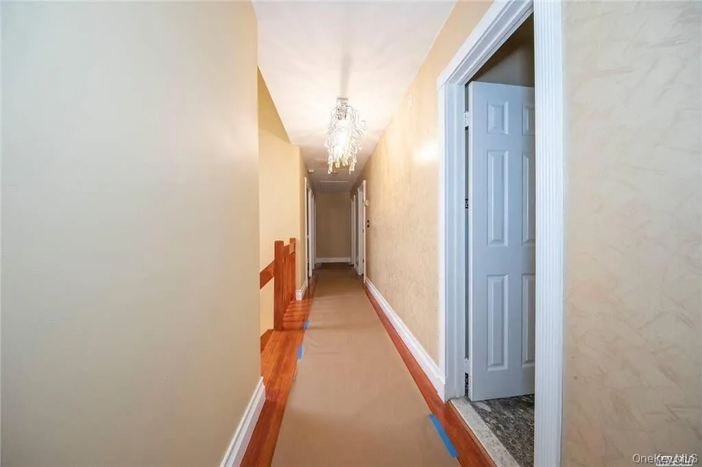 Upstairs hallway leading to Bedrooms and baths. Upstairs hallway leading to Bedrooms and baths.