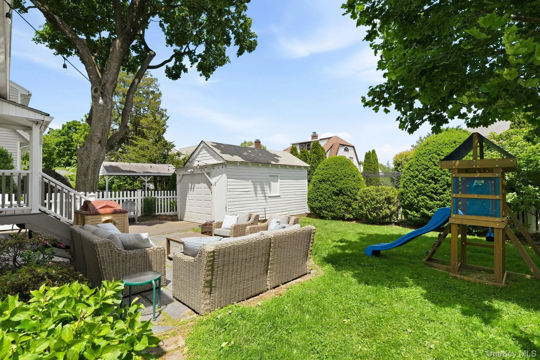 Soak up endless summer enjoyment in this beautifully landscaped outdoor oasis. Soak up endless summer enjoyment in this beautifully landscaped outdoor oasis.