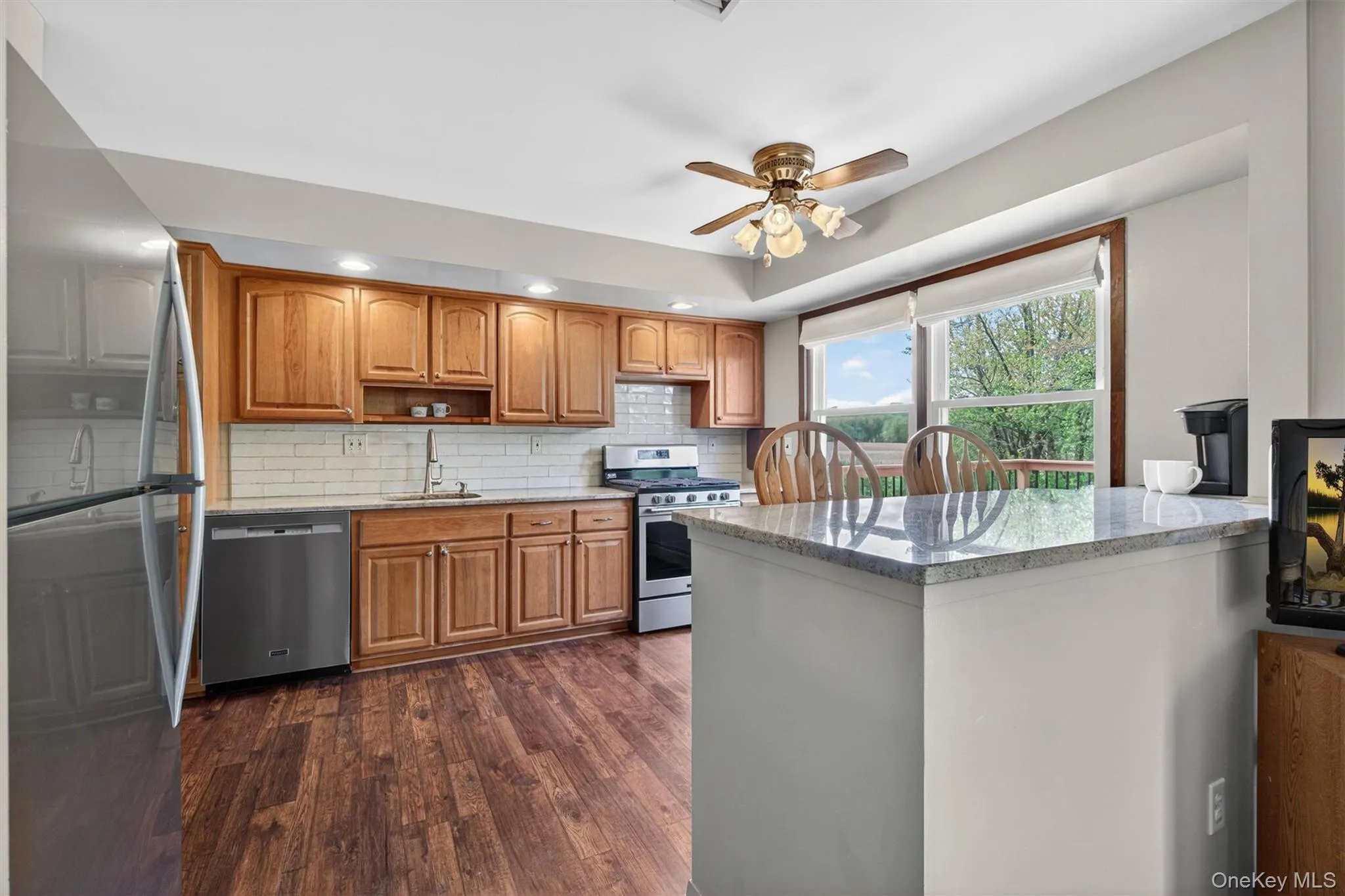 The kitchen was renovated and offers granite counters and stainless steel appliances. The kitchen was renovated and offers granite counters and stainless steel appliances.