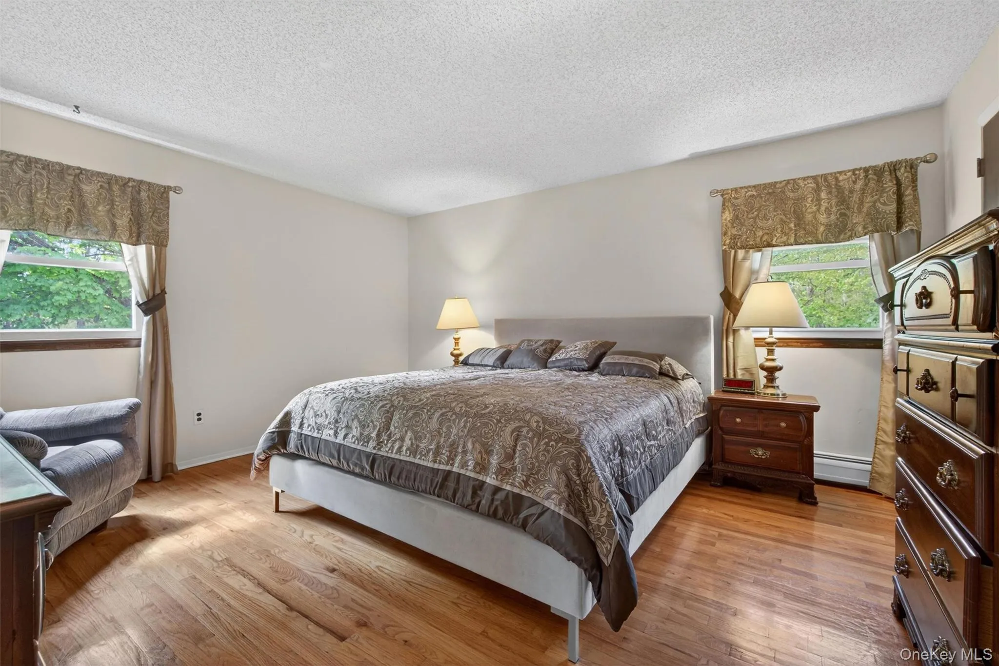 This primary suite is large enough to hold all your bedroom furniture. This primary suite is large enough to hold all your bedroom furniture.