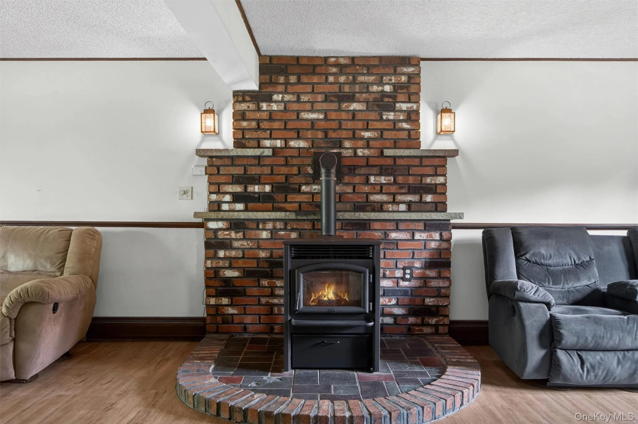 The pellet stove is the focal point of the room and offers a cozy ambiance. The pellet stove is the focal point of the room and offers a cozy ambiance.