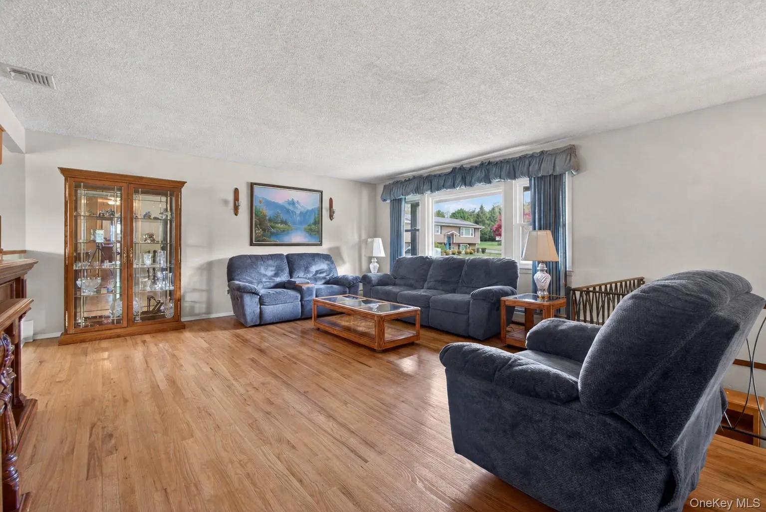 The oversized picture window allows for natural light to pour through. The oversized picture window allows for natural light to pour through.