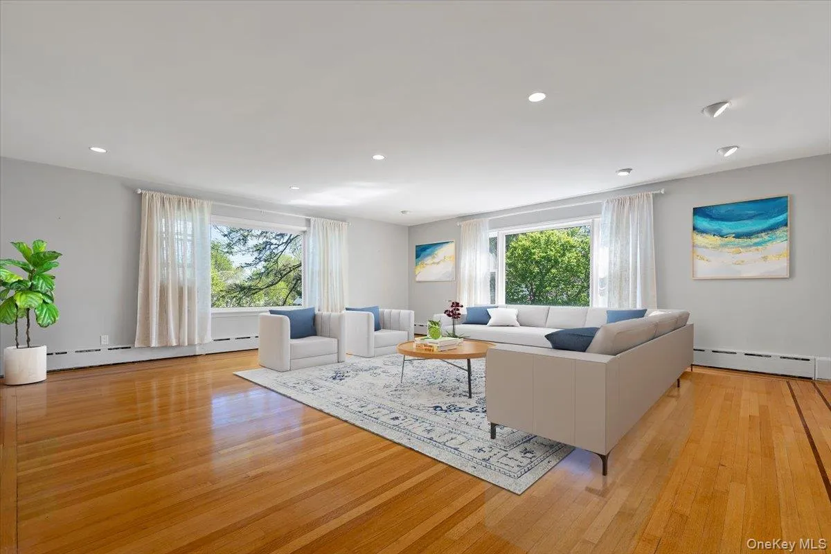 Virtually Staged Family Room with generous space and natural light Virtually Staged Family Room with generous space and natural light