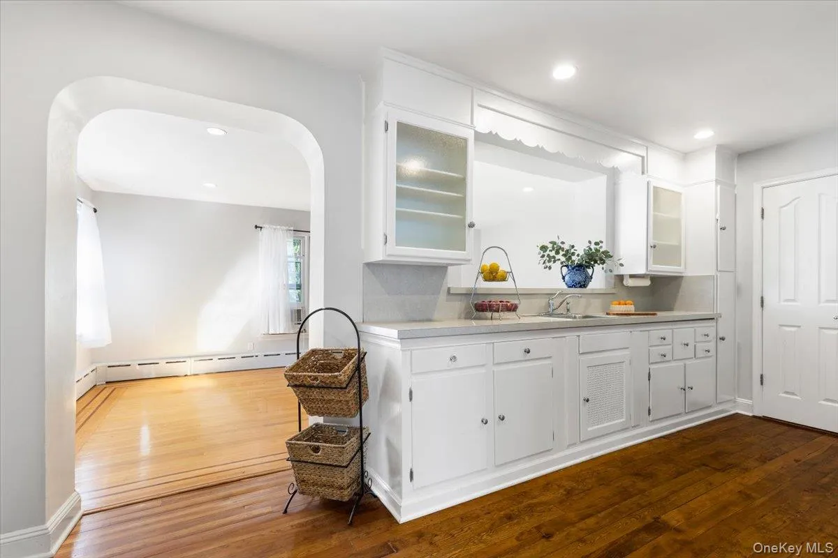 Kitchen featuring arched walkway to breakfast room Kitchen featuring arched walkway to breakfast room