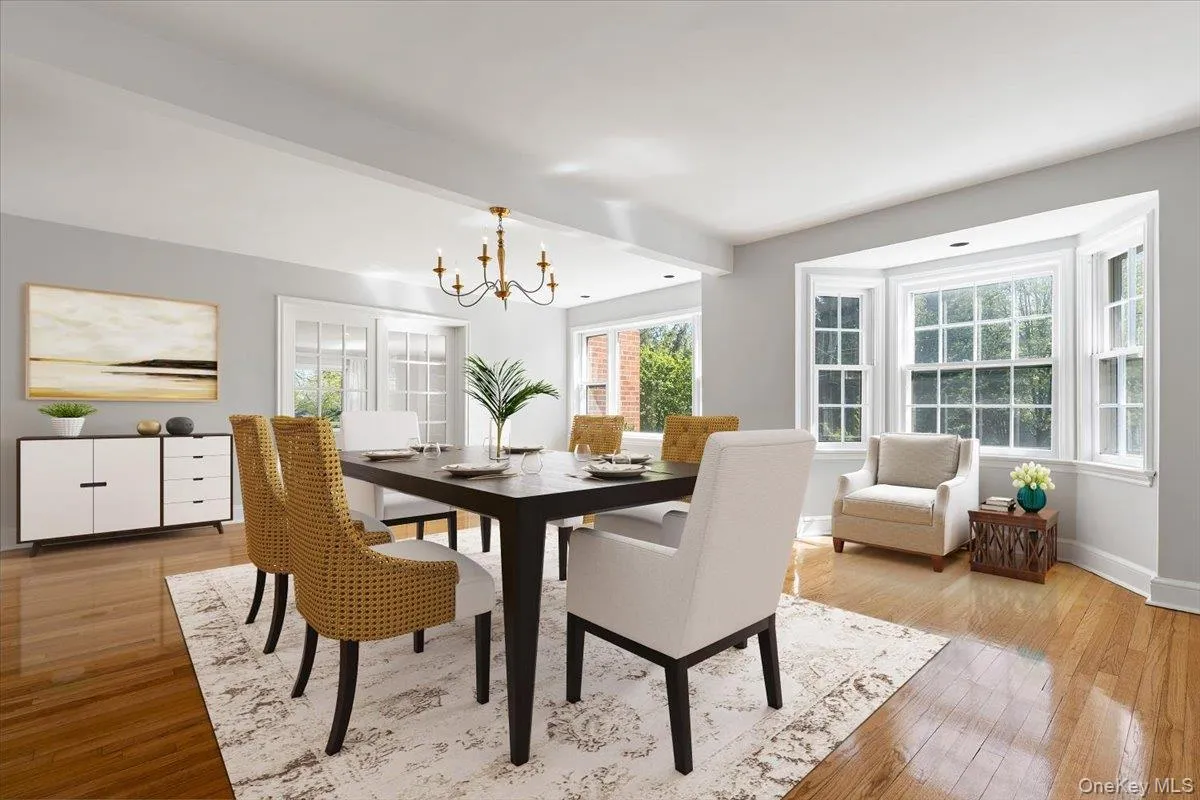 Virtually Staged Dining Room showing door to the Family Room Virtually Staged Dining Room showing door to the Family Room