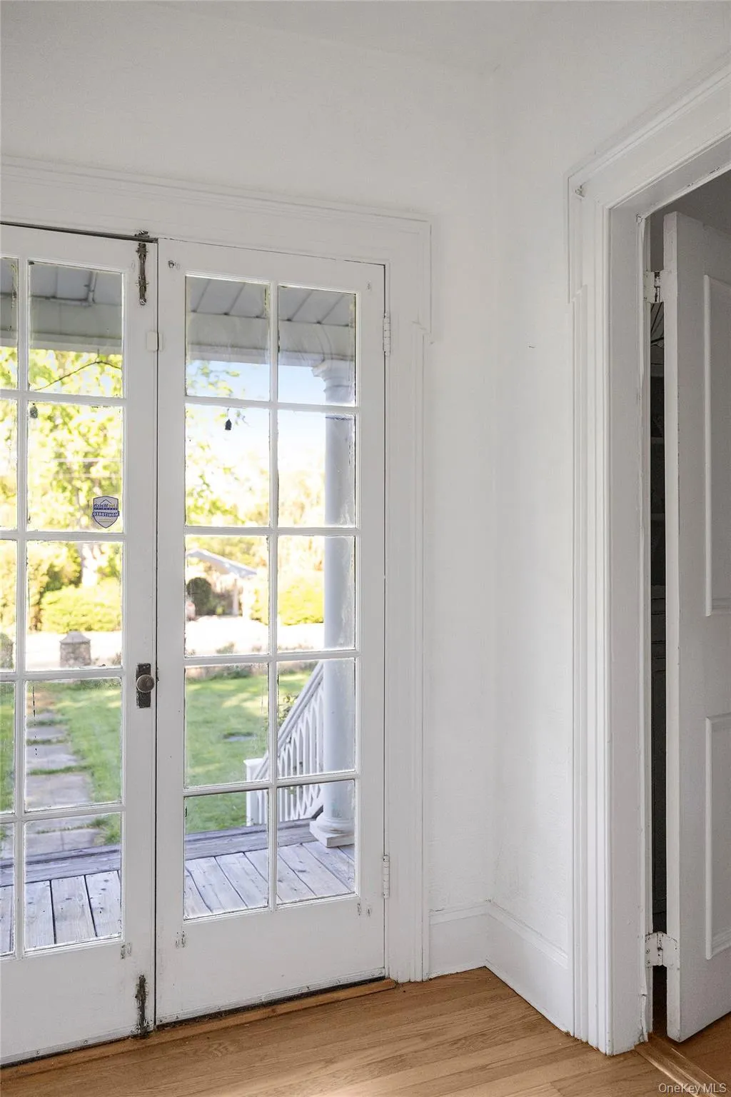 Original Front French Doors Lead into Vestibule Original Front French Doors Lead into Vestibule