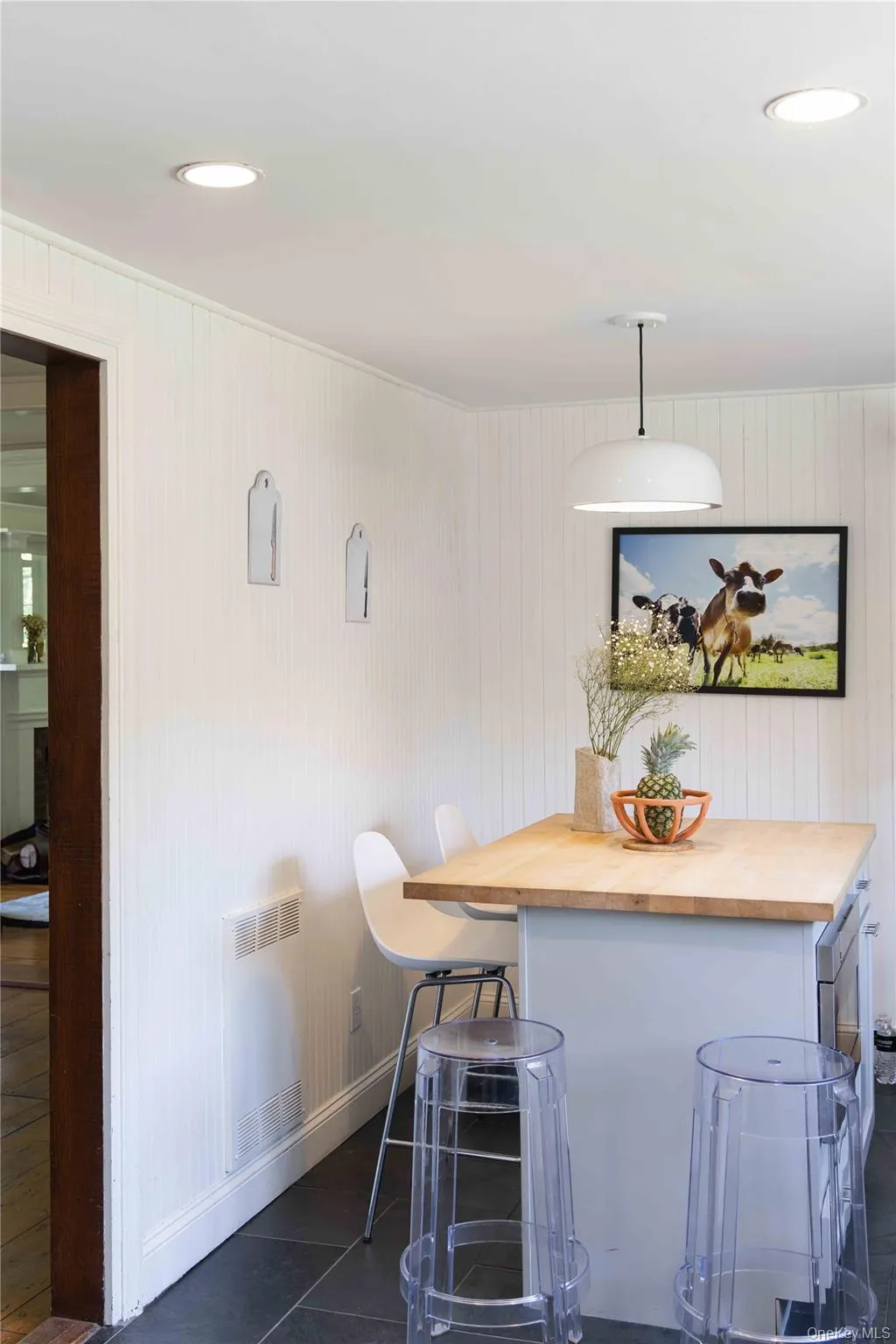 Kitchen island featuring a wood-finish countertop Kitchen island featuring a wood-finish countertop