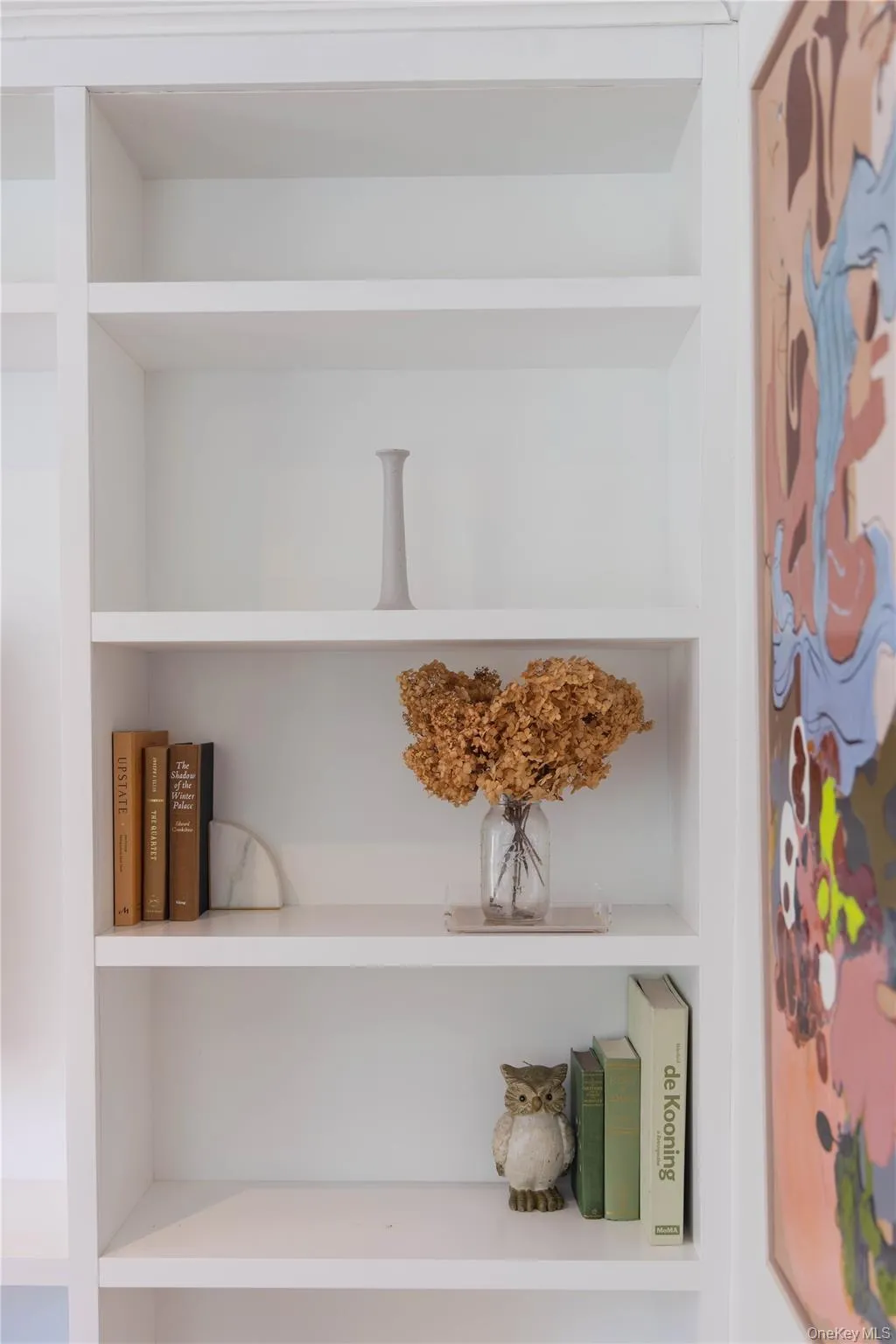 Built-in shelving with crown molding Built-in shelving with crown molding