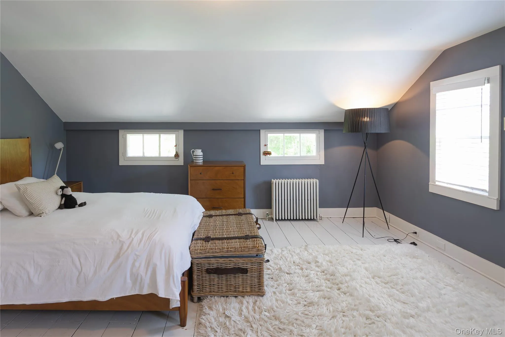 Primary Bedroom featuring an angled ceiling Primary Bedroom featuring an angled ceiling