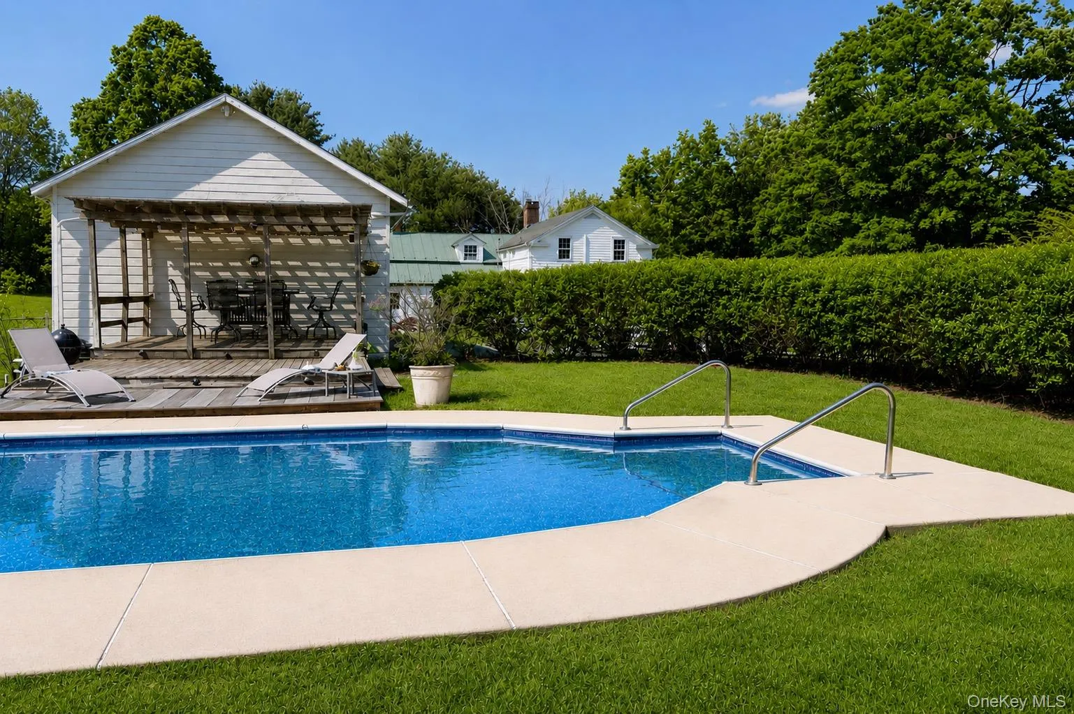 In-ground swimming pool, deck and cabana. In-ground swimming pool, deck and cabana.