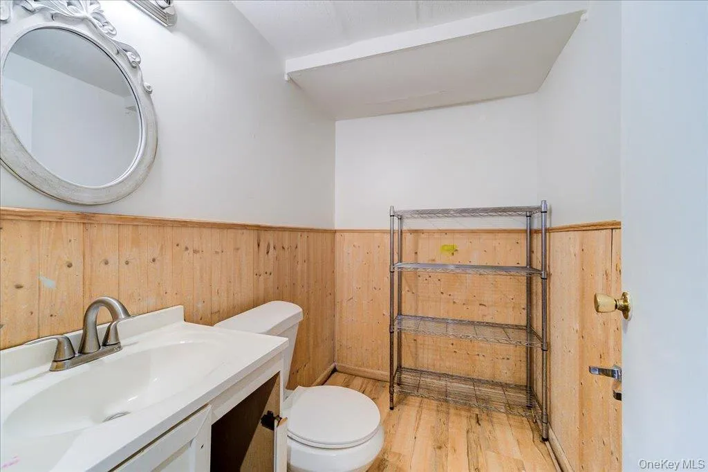 A convenient half-bathroom is located in the basement. A convenient half-bathroom is located in the basement.