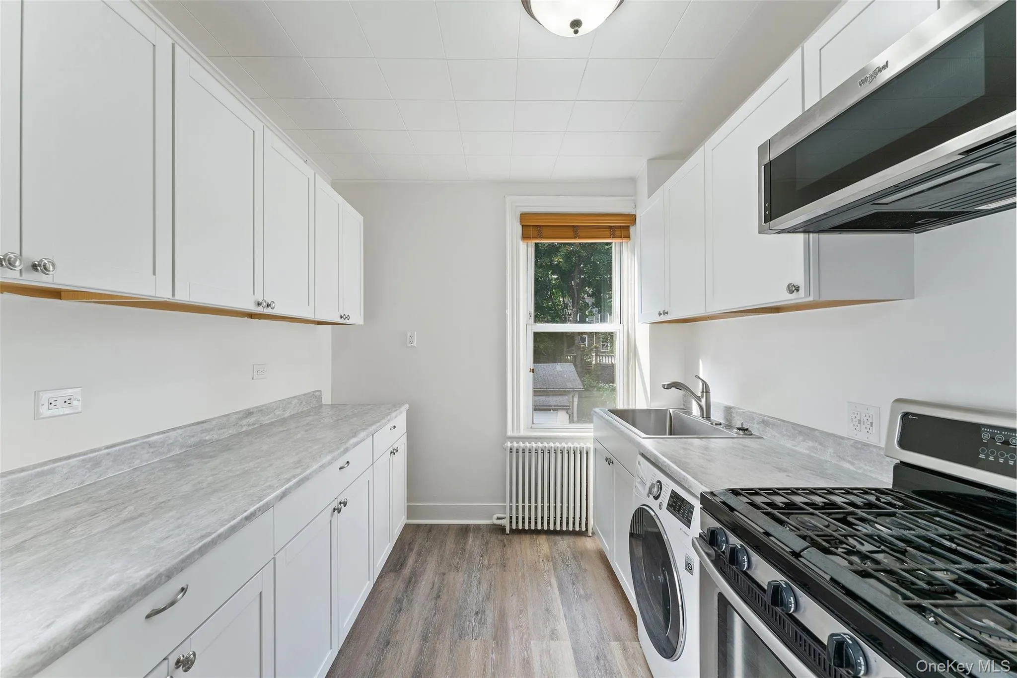 Kitchen views with washer/dryer. Kitchen views with washer/dryer.