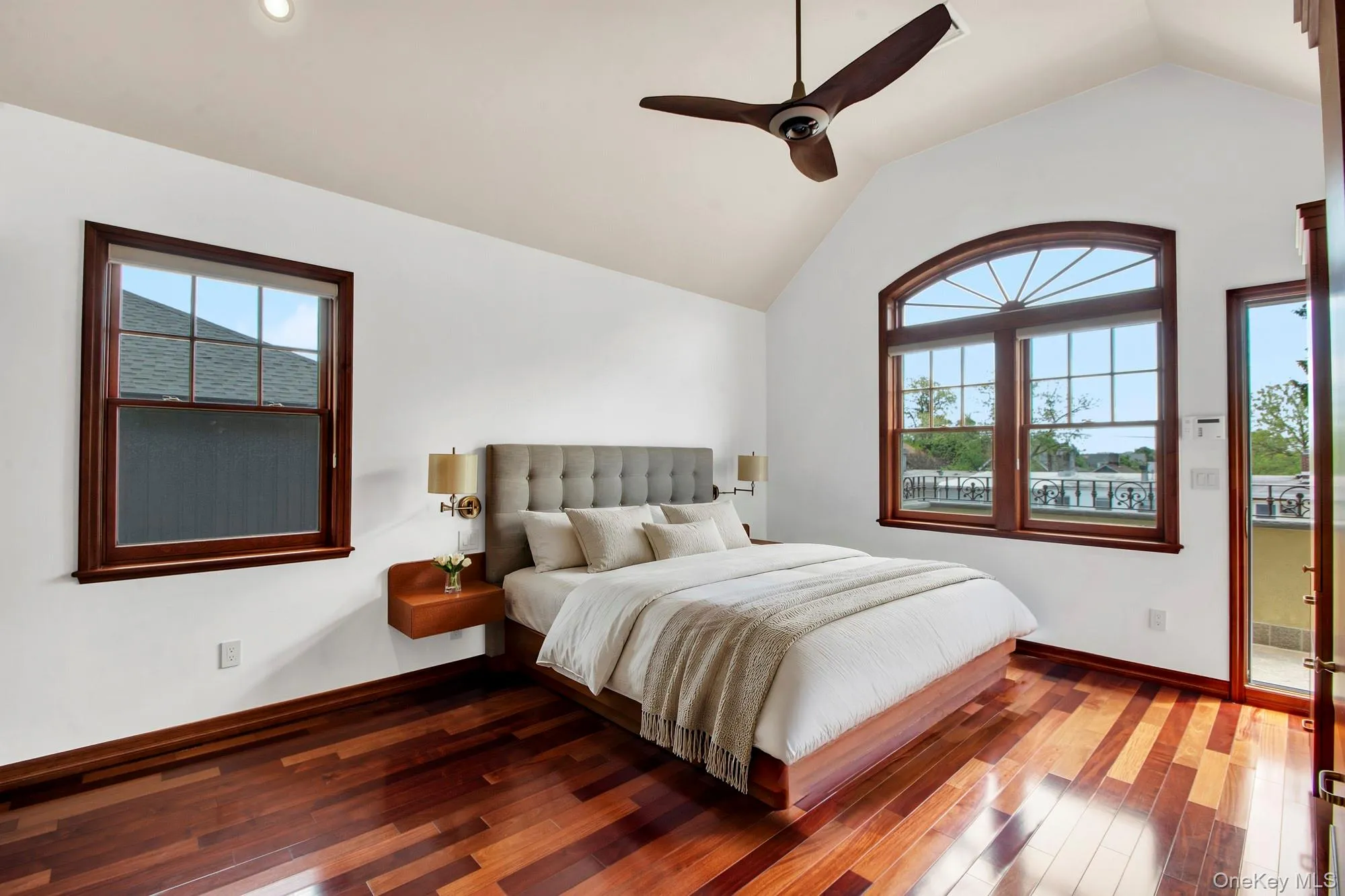 Vaulted ceiling interior featuring rich wood-finish flooring Vaulted ceiling interior featuring rich wood-finish flooring