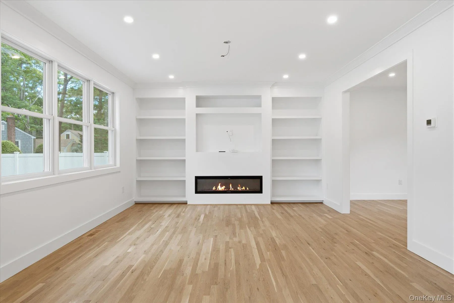 Family Room with built ins and Tv area which will fit up to an 85" TVPlus and Electric Fireplace Family Room with built ins and Tv area which will fit up to an 85" TVPlus and Electric Fireplace
