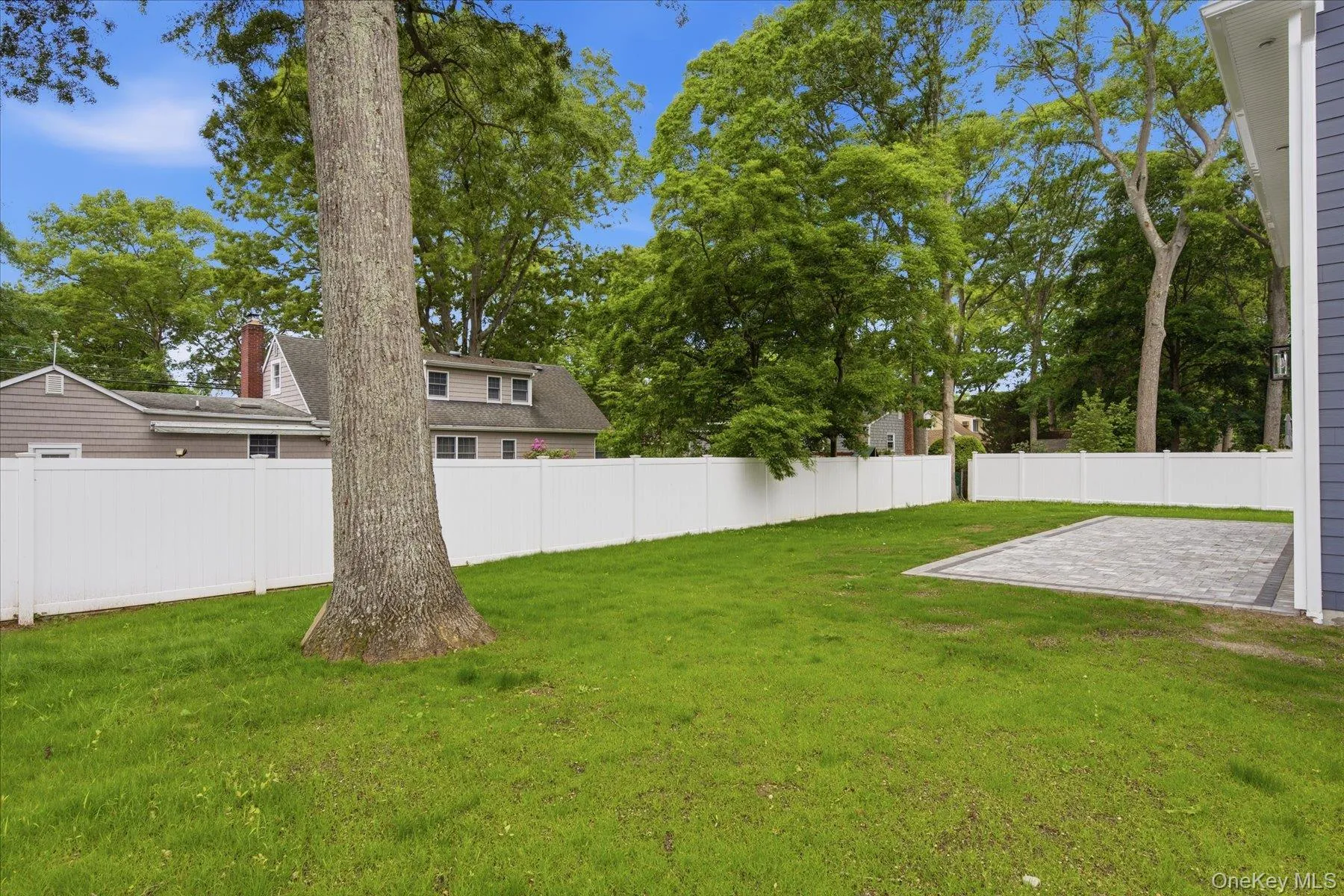 Fenced in yard with vinyl fencing. Fenced in yard with vinyl fencing.