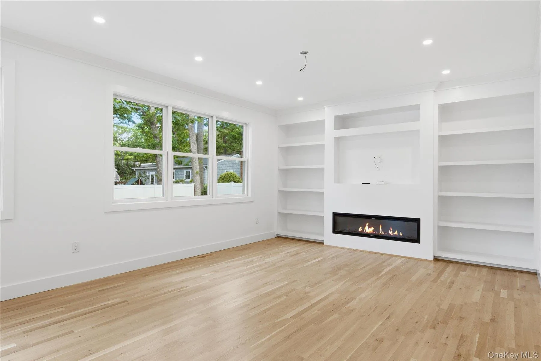 Family Room with built ins and Tv area which will fit up to an 85" TVPlus an Electric Fireplace Family Room with built ins and Tv area which will fit up to an 85" TVPlus an Electric Fireplace
