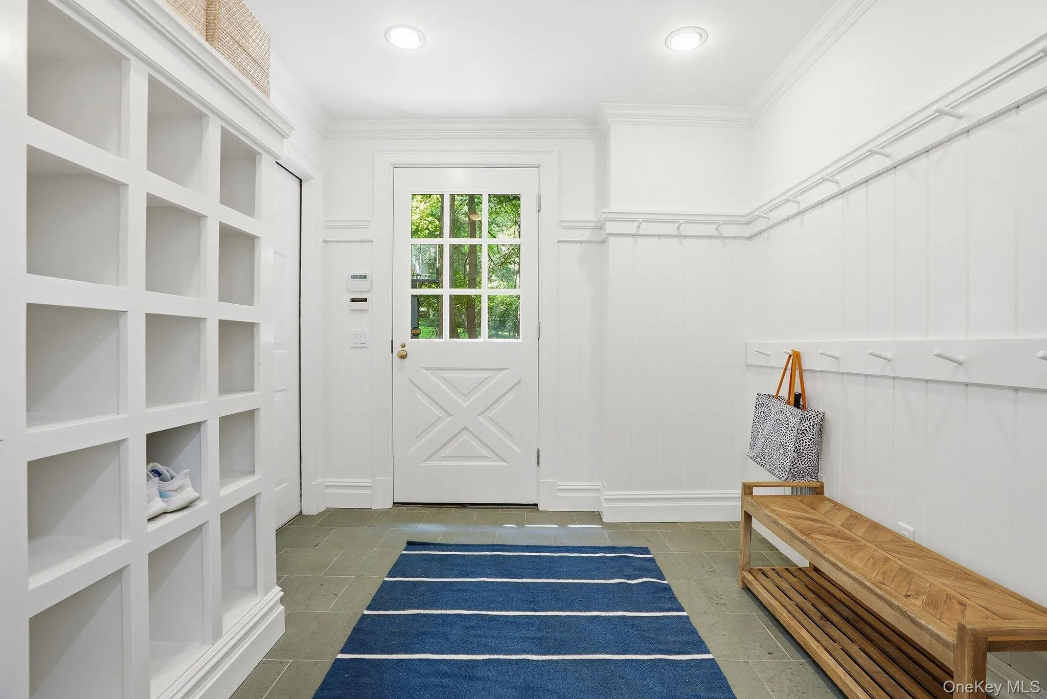 Mud Room with Door out to Driveway and Bonus Storage Room Mud Room with Door out to Driveway and Bonus Storage Room