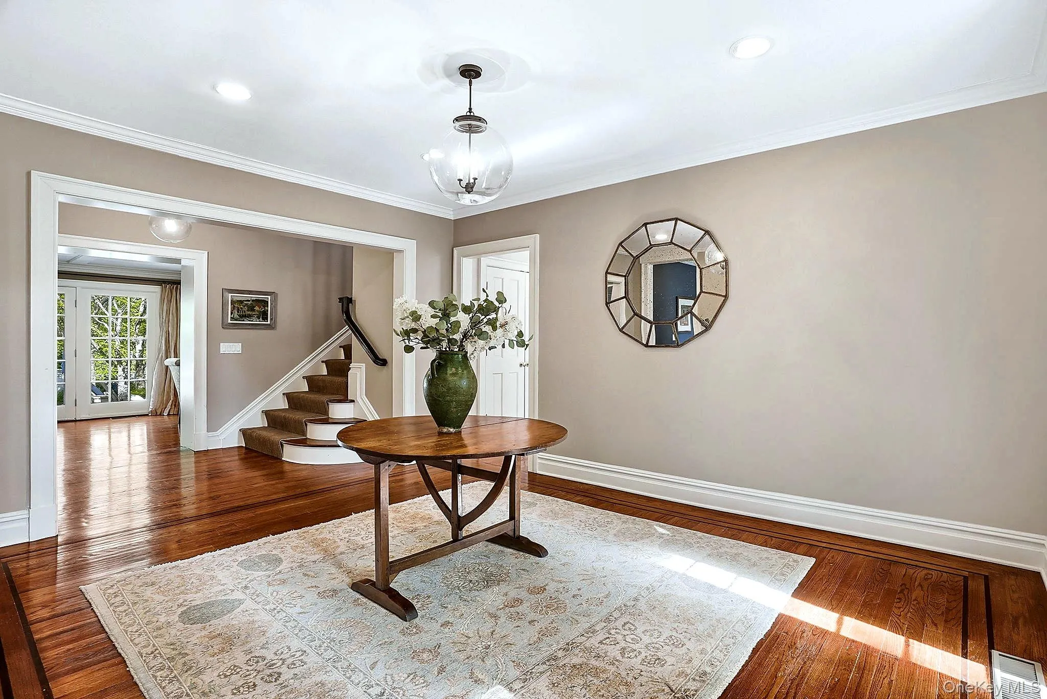 Welcoming Foyer w/ Hardwood flooring throughout Welcoming Foyer w/ Hardwood flooring throughout
