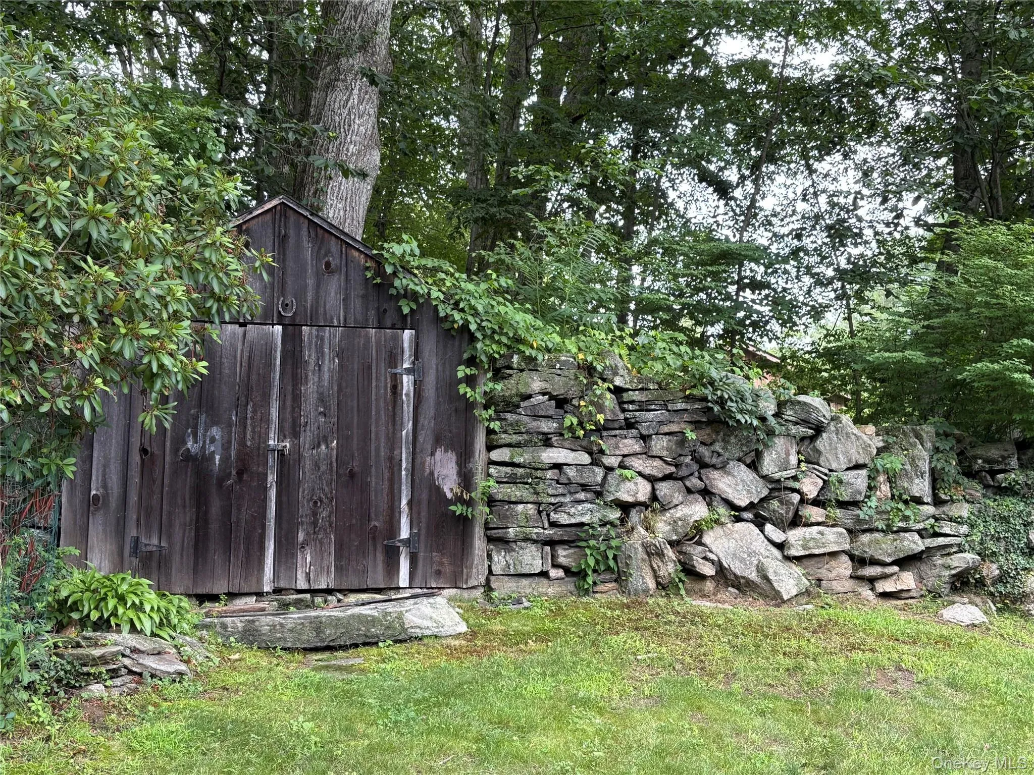A unique outbuilding on the property. A unique outbuilding on the property.