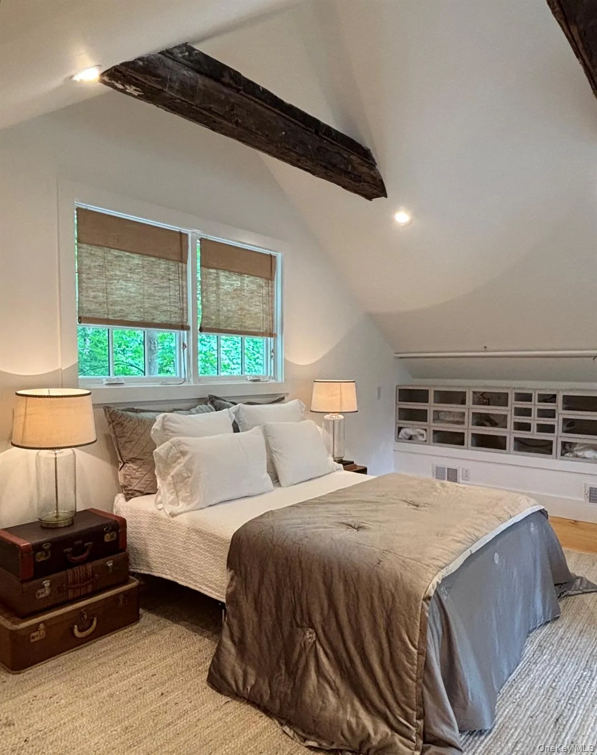 The rustic beamed ceiling is one of the many features recreated in the renovation to maintain the original antique charm. The rustic beamed ceiling is one of the many features recreated in the renovation to maintain the original antique charm.
