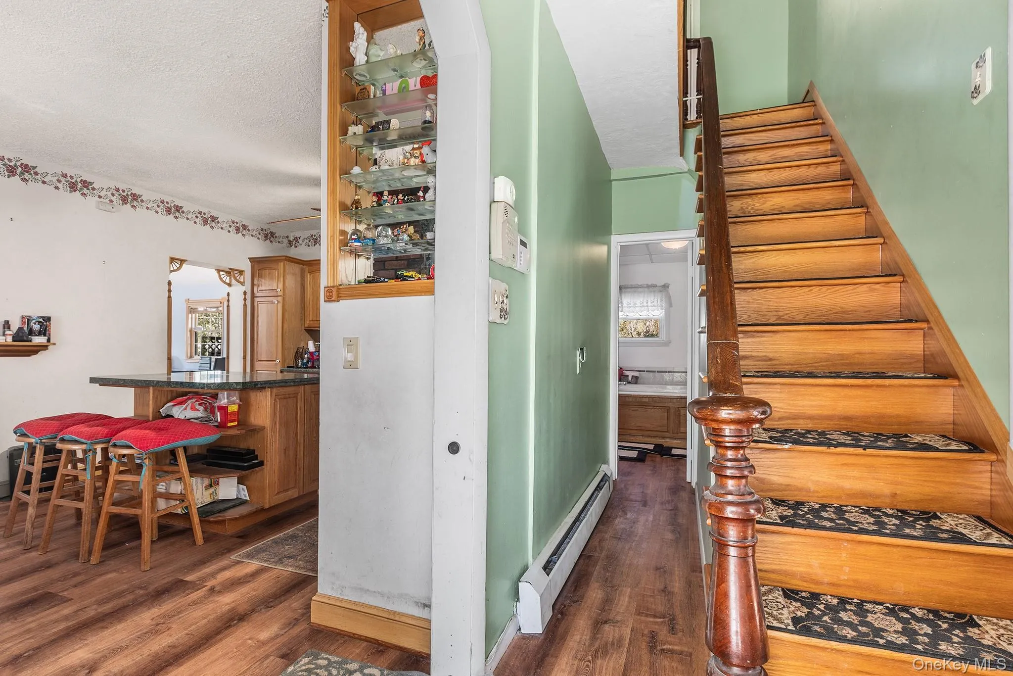 Hardwood staircase with decorative newel post Hardwood staircase with decorative newel post