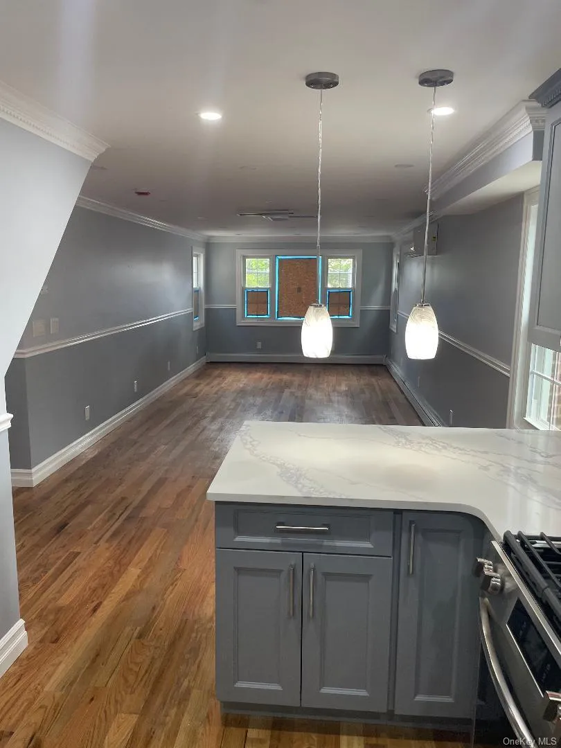 Kitchen with Cabinetry and Stainless Steel Appliances and Lighting Kitchen with Cabinetry and Stainless Steel Appliances and Lighting
